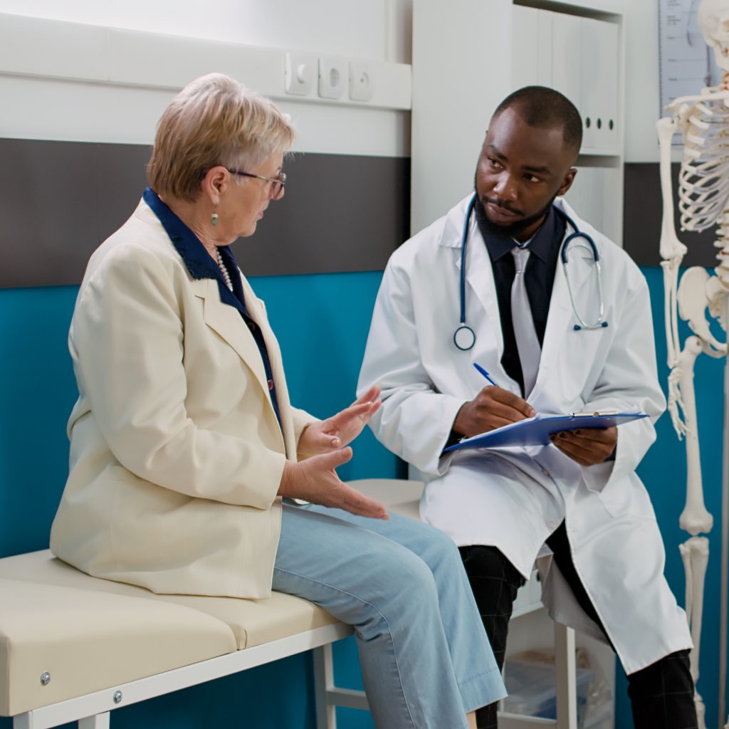 Physician doing medicare consultation with senior patient